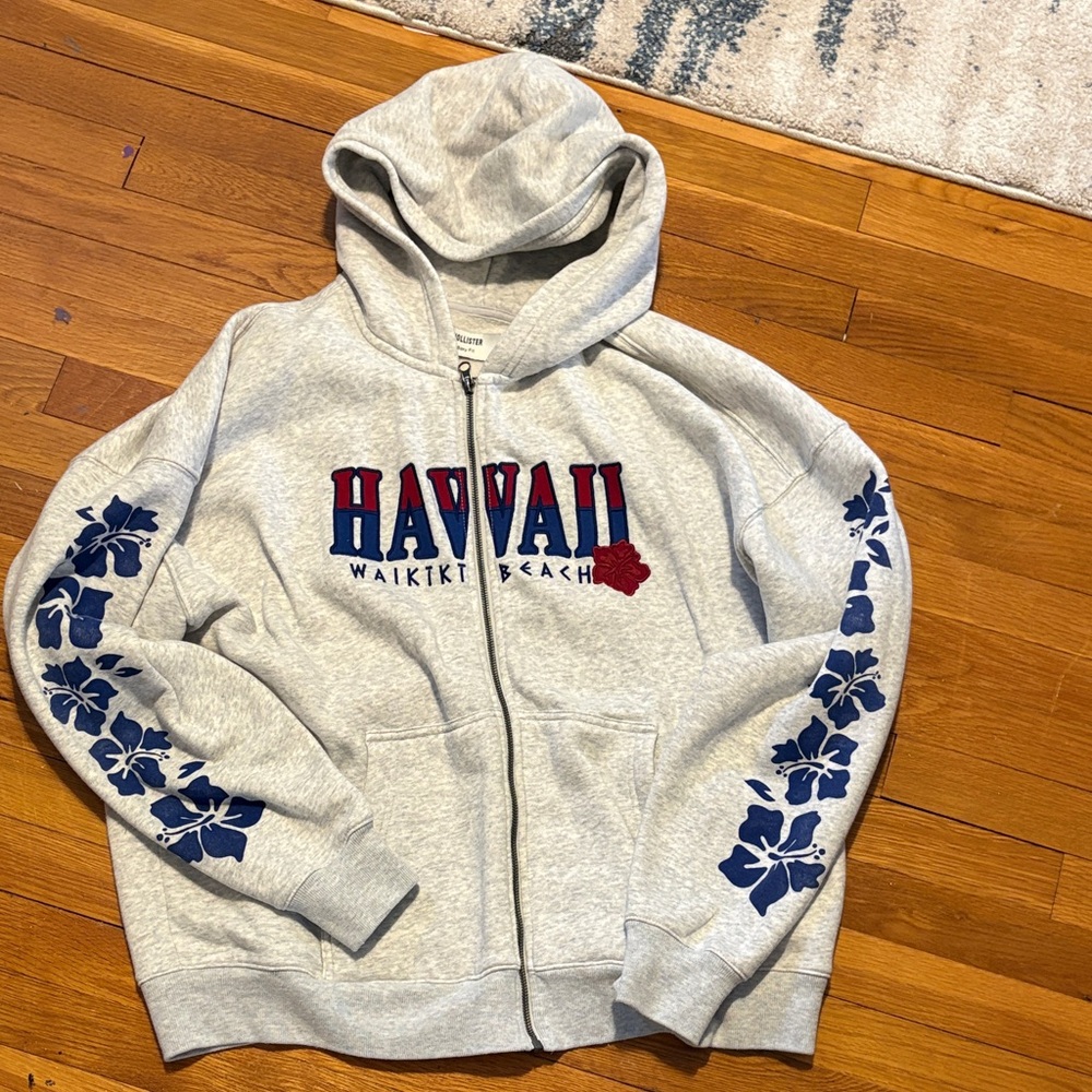 Hollister Hawaii Waikiki Beach Grey Zip-Up Hoodie with Blue Floral Sleeves